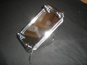 UNIVERSAL CHROME SIDE MOUNT LICENSE PLATE W/LIGHT 